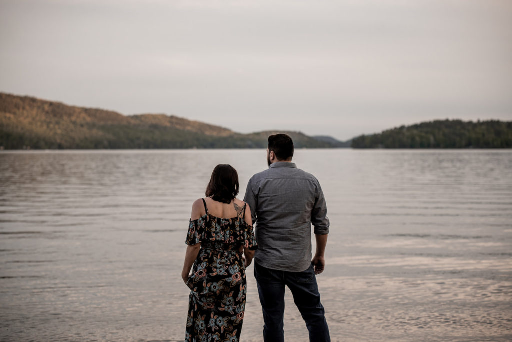 Proposing on the beach in Schroon Lake, NY in the Adirondacks