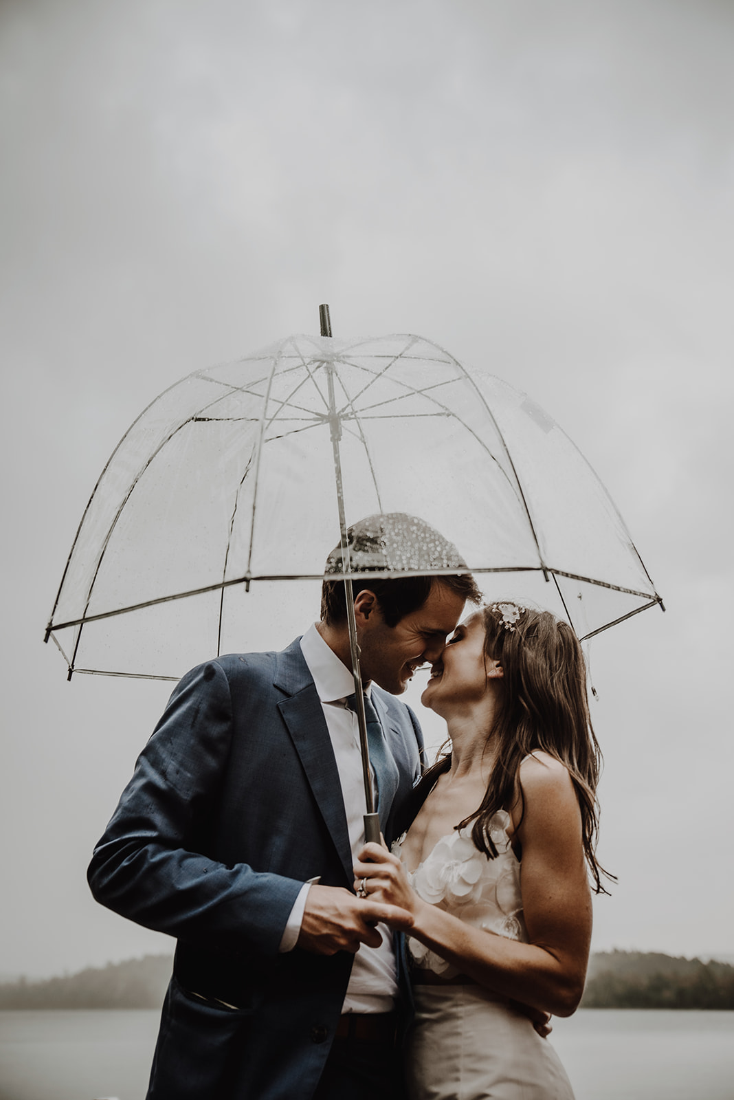 Rainy clear umbrella elopement photo in the ADKs