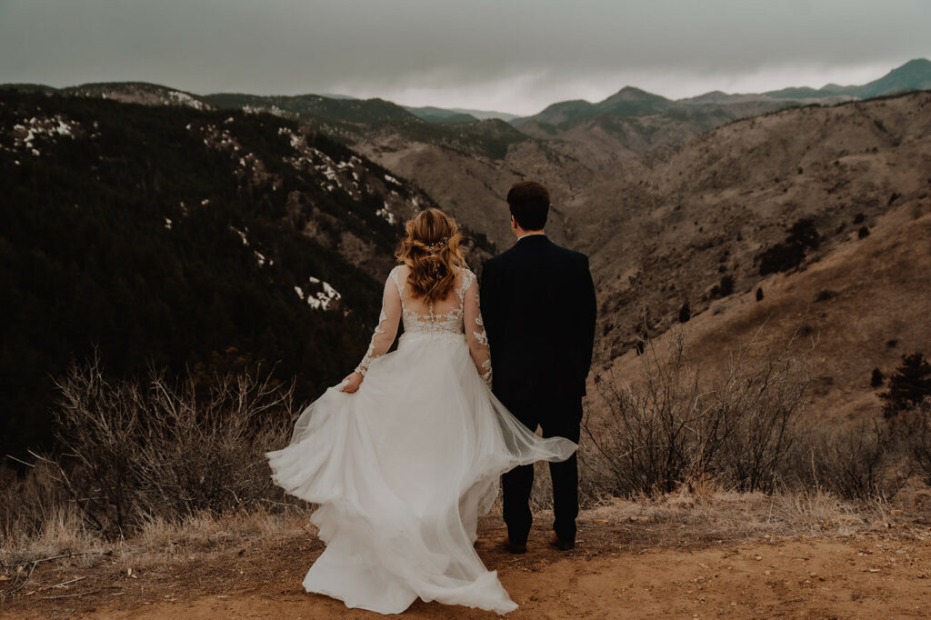 Bride and groom eloping in the Rocky Mountains 