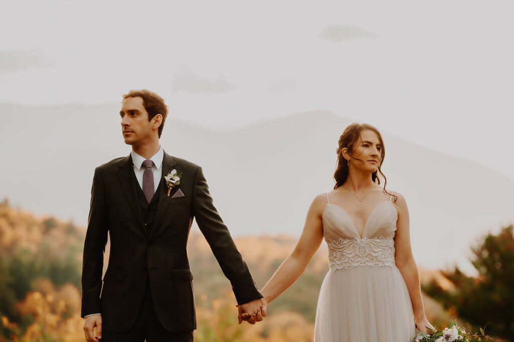 Couple holding hands in the Adirondacks