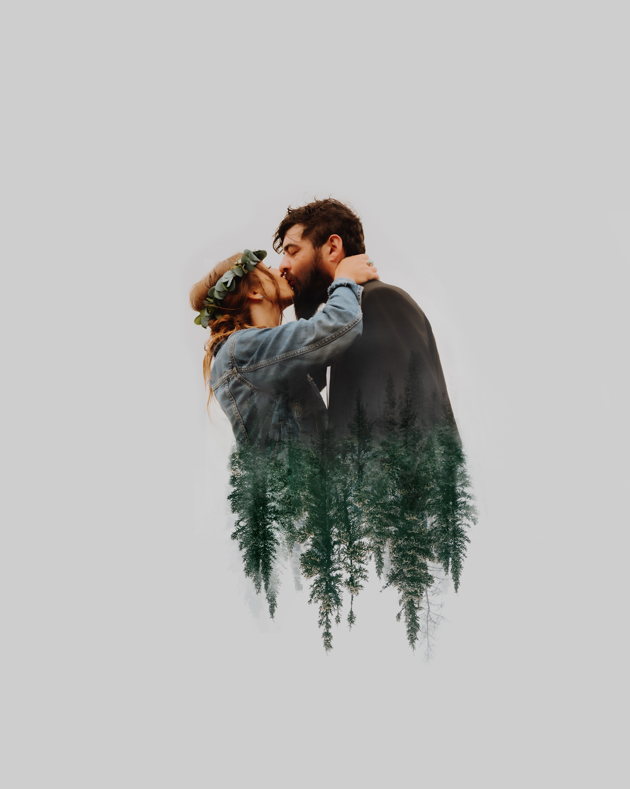 Creative Photoshop edit of a couple faded into trees