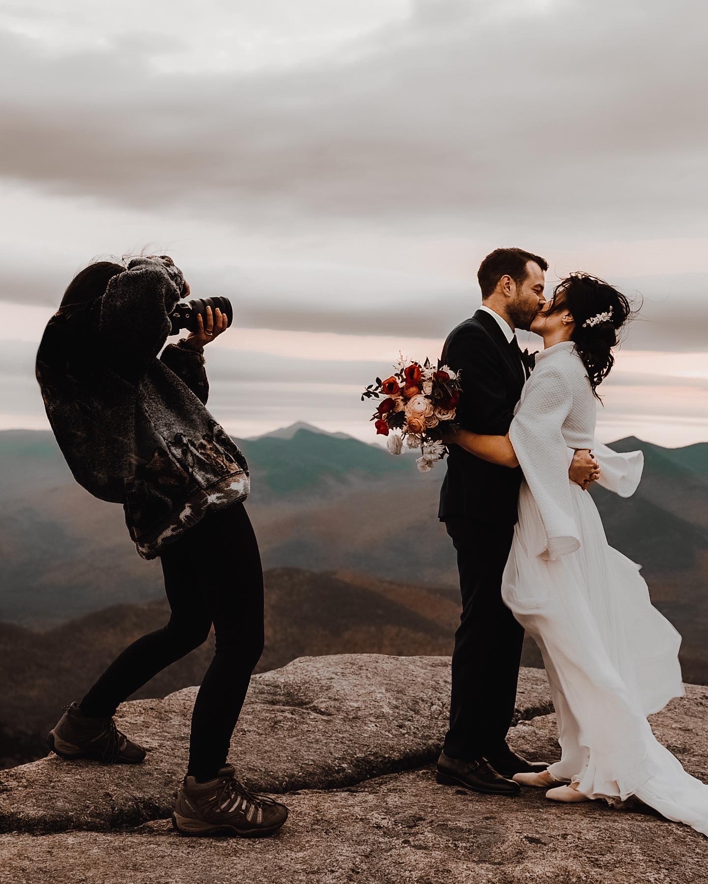 Behind the scenes of elopement photographer, Laura Pinckard, photographing a mountaintop wedding